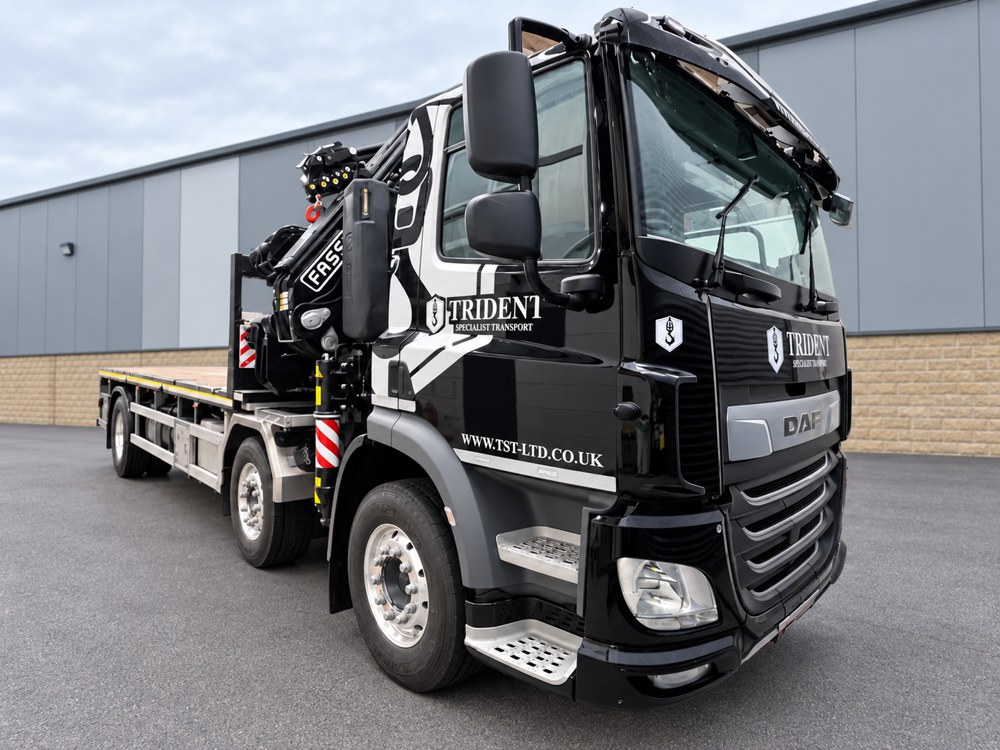 Trident truck graphics with a digitally retouched daylight background